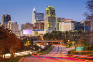 downtown raleigh at sunset from western boulevard.